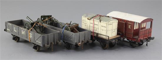 A set of four: NE guards van by Leeds Model Co, No 71911, BR flat wagon with load, No 41713,
